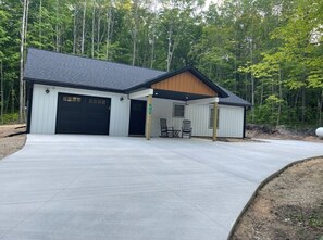 Exterior - Newly built barndominium in the forest. (Manton)