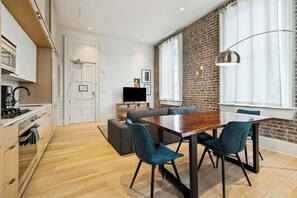 Fridge, microwave, oven, stovetop - Modern 1BR in Historic Schoolhouse | Gated Parking (New Orleans)