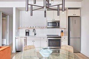 Fridge, microwave, oven, stovetop - Comfortable 2 BR Apartment in CBD | Near FQ + Superdome (New Orleans)