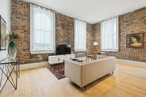 TV, offices - Modern 1BR in Historic Schoolhouse | Gated Parking | Near Superdome (New Orleans)