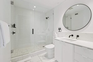 Shower, hair dryer, towels, shampoo - Modern 1BR in Historic Schoolhouse | Gated Parking | Near Superdome (New Orleans)