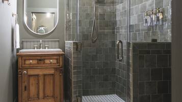 Shower, hair dryer, towels, shampoo