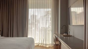 Ropa de cama de alta calidad, colchones con acolchado adicional, minibar