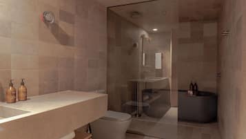 A modern bathroom with a glass-enclosed shower, a vanity with a sink, and a toilet.