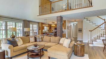 TV, fireplace, books, video library