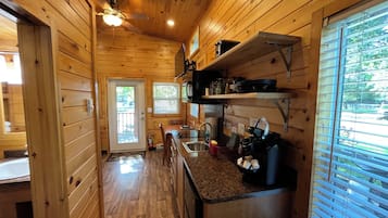 Fridge, microwave, stovetop, coffee/tea maker