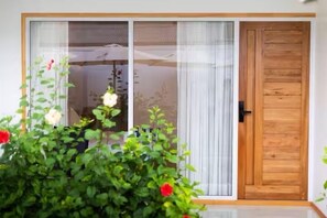 Deluxe Double or Twin Room, 1 King Bed, Patio, Garden View | In-room safe, desk, laptop workspace, blackout drapes - Handhuvaru Maldives  (Milandhoo)