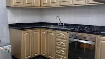 Luxury Apartment, Partial Sea View | Private kitchen