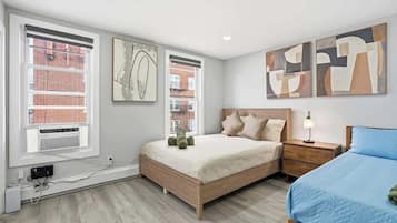 2 slaapkamers, een strijkplank/strijkijzer, reisbedje, wifi