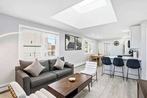 TV, offices - Elevated 2BR w/Balcony | PATH & MetLife Stay NYC (Jersey City)