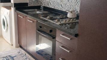 Deluxe Apartment, Balcony | Private kitchen