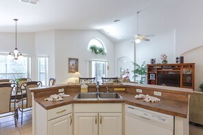 Fridge, microwave, oven, stovetop - Private Pool with spa and Game Room Near Disney (Kissimmee)