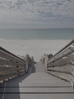 A wooden staircase leading to a beach with a clear view of the ocean. - 30A Cottage Escape | 5 min to beach | Cart & Bikes (Santa Rosa Beach)