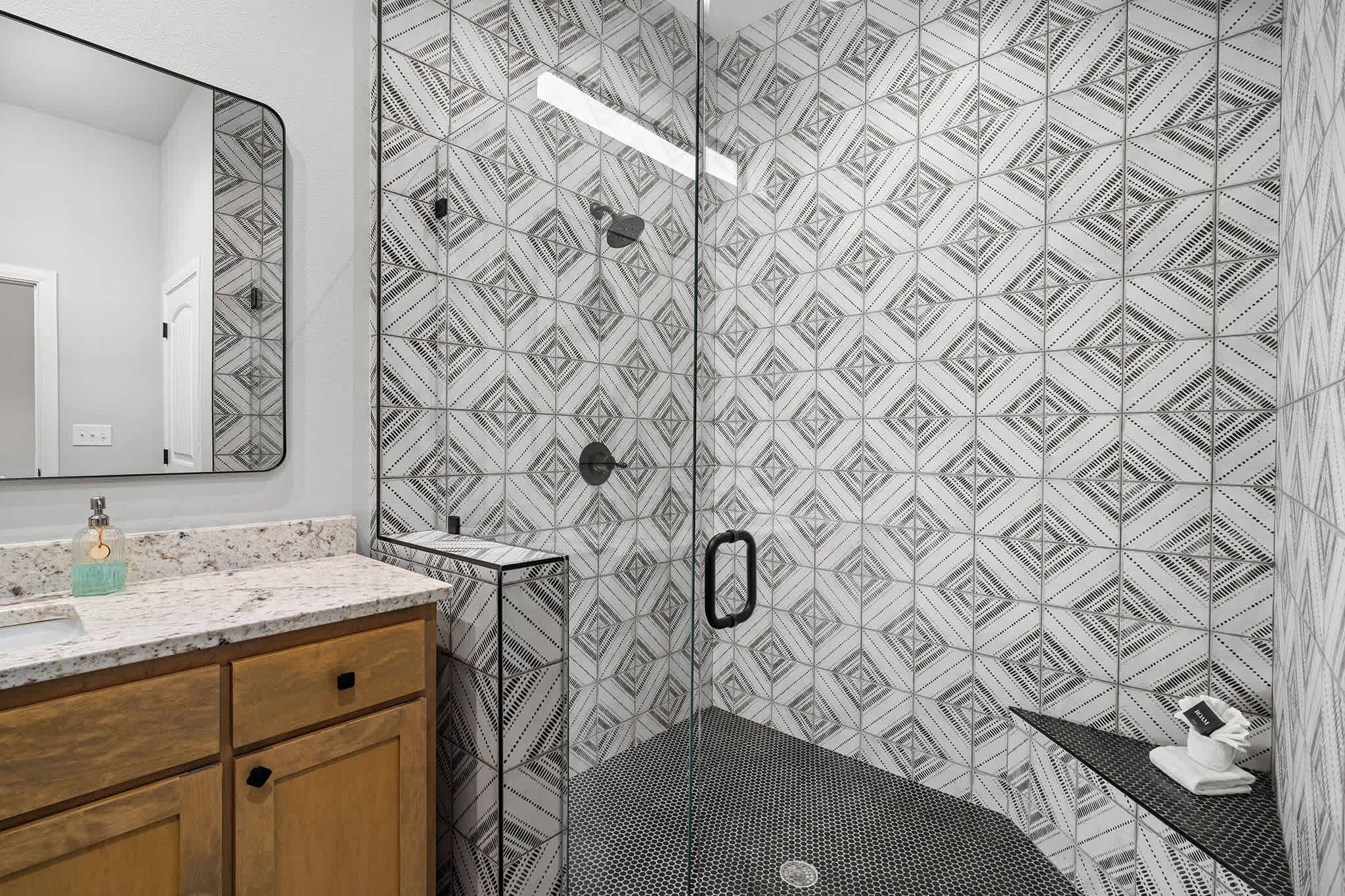 Shower, hair dryer, towels, shampoo