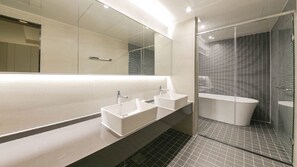 Family Suite | Bathroom | Hair dryer, slippers, towels, soap - Gimhae The Van Hotel (Gimhae)