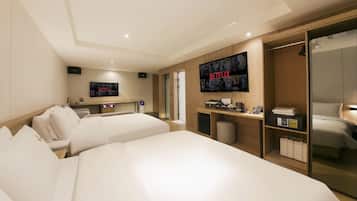 Family Suite | Individually furnished, blackout drapes, soundproofing, free WiFi