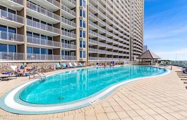 Outdoor pool, a heated pool - Beachfront condo with 180 degree views of the beautiful Emerald Beach in PCB! (Panama City Beach)