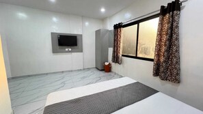 Habitación ejecutiva, vistas a la ciudad | Escritorio y wifi gratis