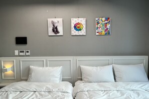 Deluxe Triple Room, Private Bathroom, City View | Desk, blackout drapes, iron/ironing board, free WiFi