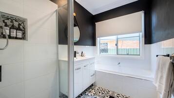 Shower, hair dryer, towels, soap