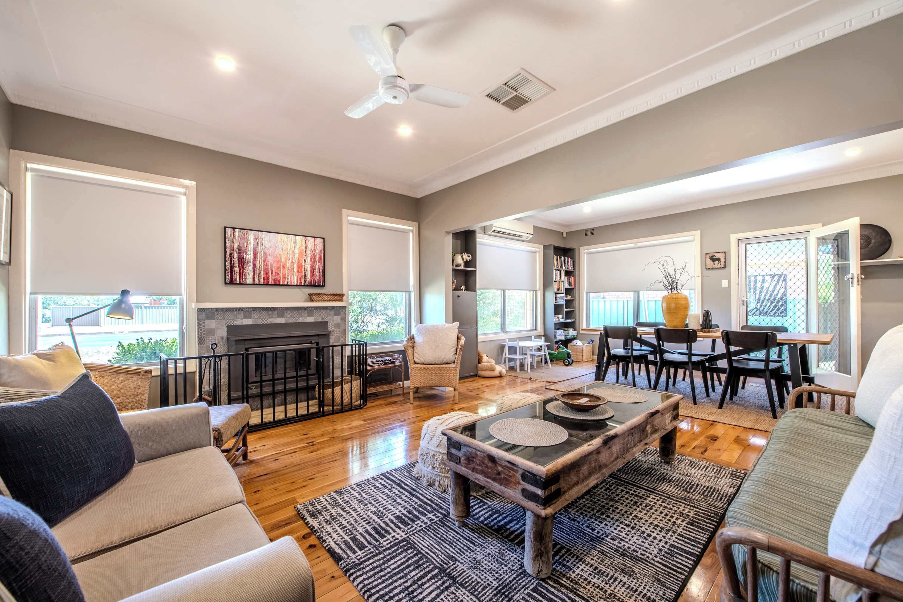 Televisión, chimenea y oficina 