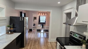 Microwave, oven, stovetop, dishwasher - Spacious 2-Bedroom Near Downtown Moncton | Parking, AC & Private Backyard (Moncton)