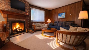 Smart TV, fireplace, foosball, books
