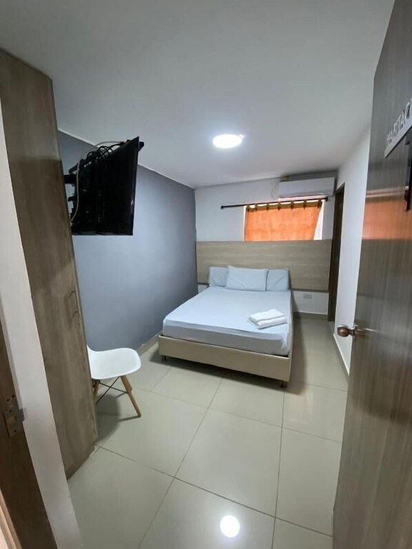 Basic Double Room, Patio, Garden View | Desk, free WiFi
