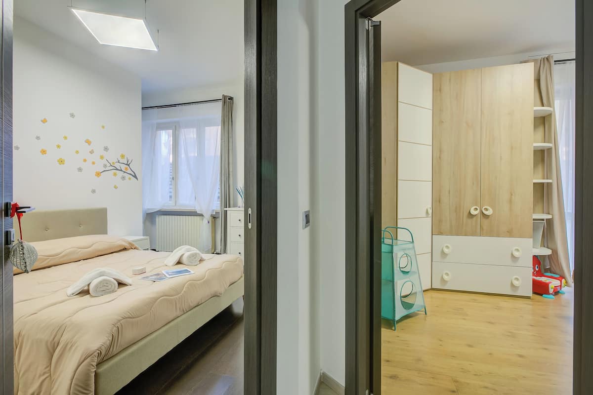 อพาร์ทเมนท์สำหรับครอบครัว, หลายห้องนอน (Asia Apartment Laveno Center) | 2 ห้องนอน, เตารีด/โต๊ะรีดผ้า, Wi-Fi ฟรี, ผ้าปูที่นอน