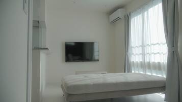Premier Triple Room, City View | Laptop workspace, blackout drapes, iron/ironing board, free WiFi