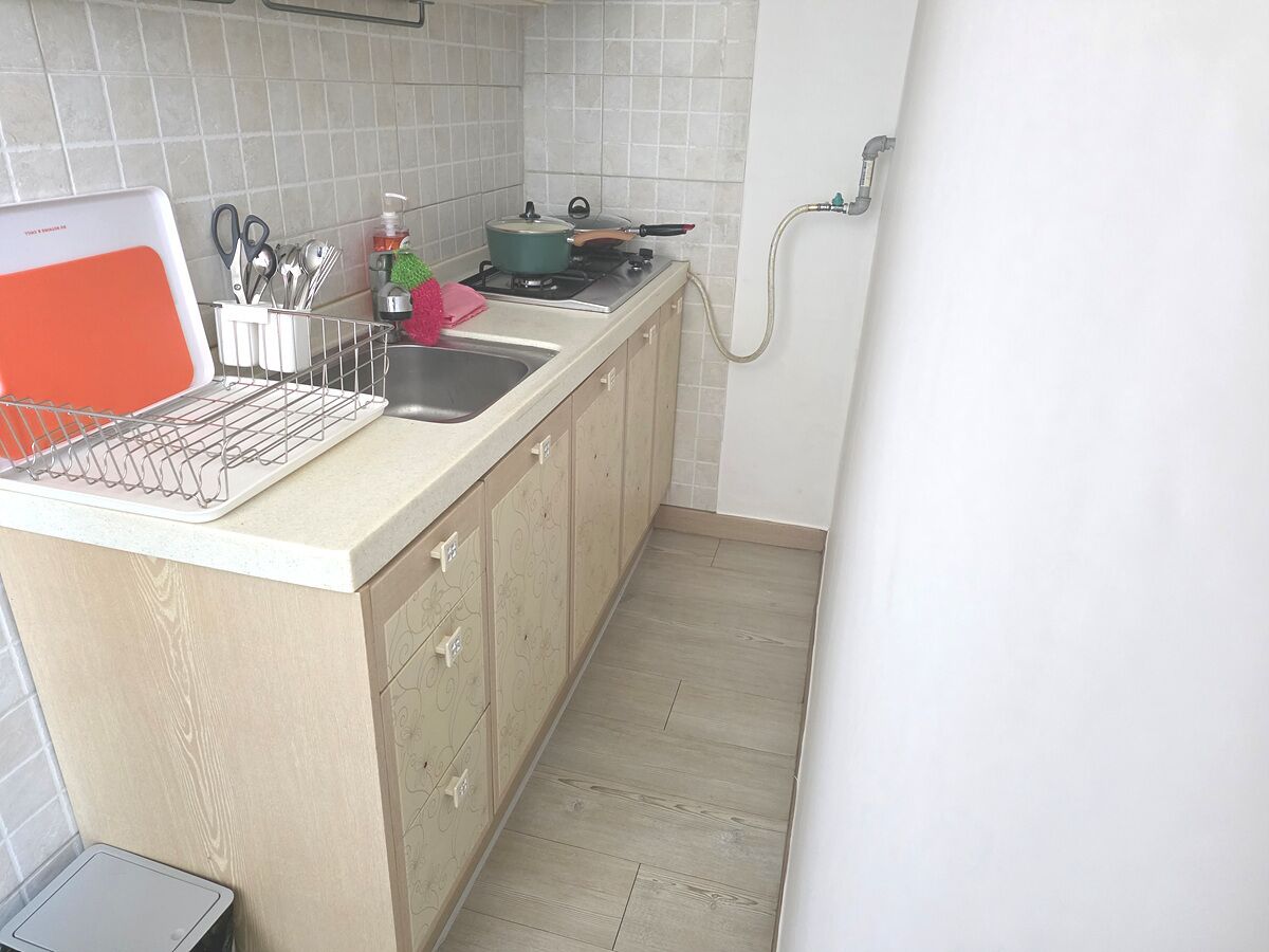 Fridge, microwave, cookware/dishes/utensils, dining tables