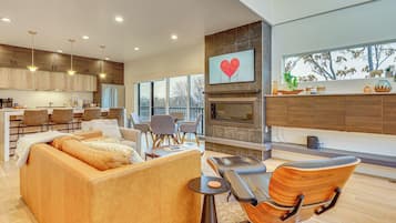 TV, fireplace, books, stereo