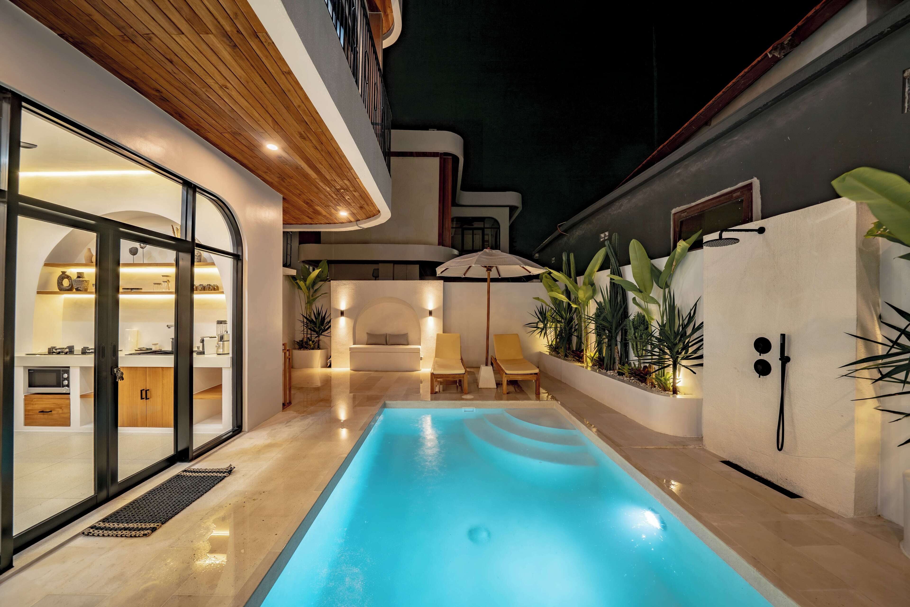 Outdoor pool, pool umbrellas, pool loungers