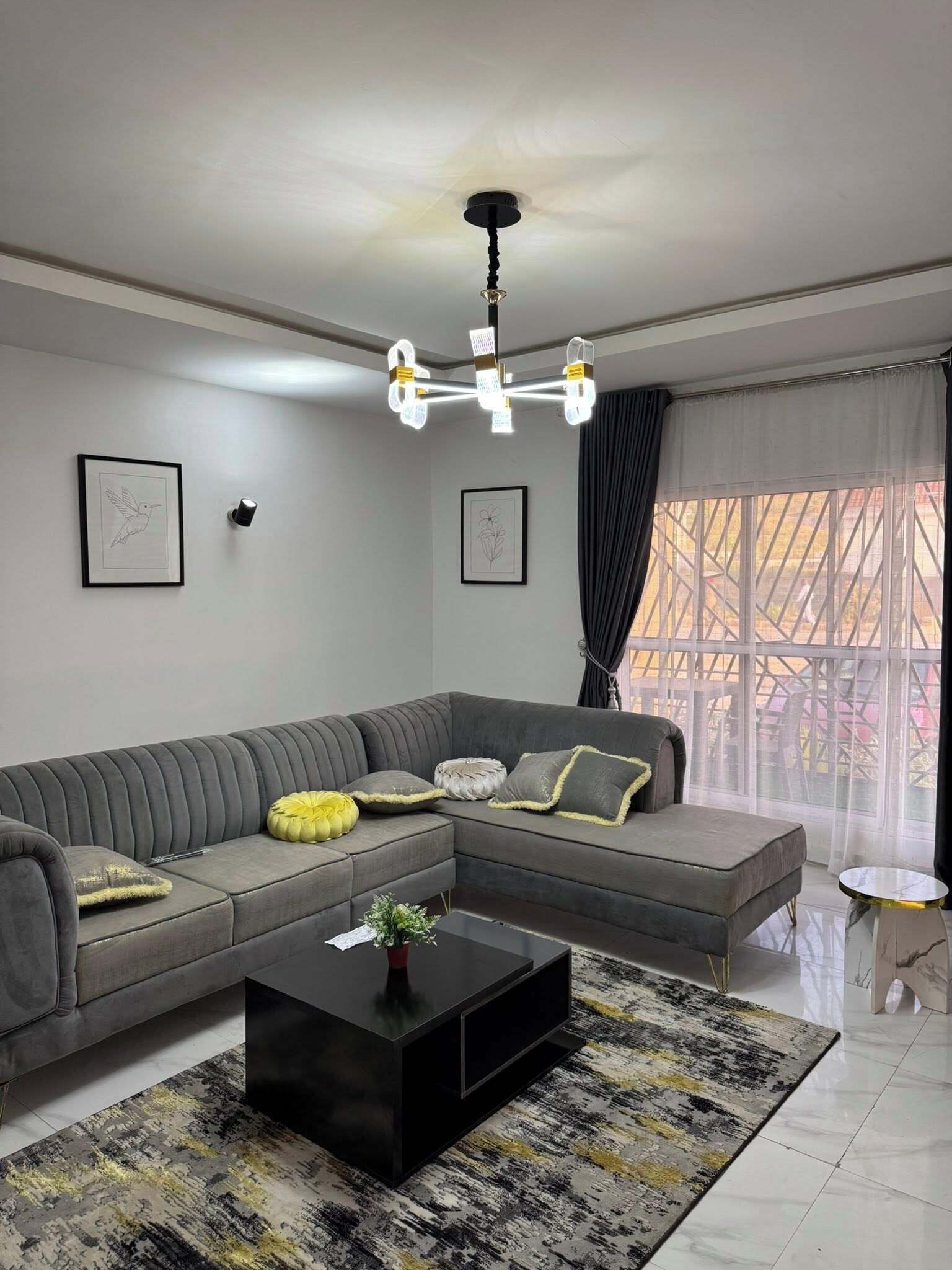 Habitación junior, balcón, vistas a la ciudad | Zona de estar