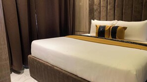 Deluxe Room, Balcony, City View | Desk, laptop workspace, blackout drapes, soundproofing