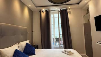 2 habitaciones, tabla de planchar con plancha, internet y ropa de cama