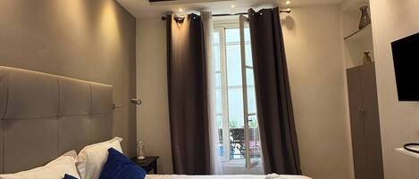 2 habitaciones, tabla de planchar con plancha, internet y ropa de cama