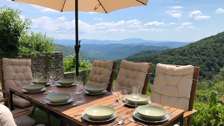 Outdoor dining. Villa Rustica Oprtalj by Villas Guide