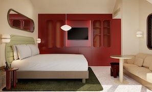 A modern hotel room with a large bed, a TV mounted on the wall, a sofa, and a small table. - The Standard Lisbon (Lisbon)