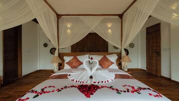 Premium bedding, pillow-top beds, minibar, in-room safe