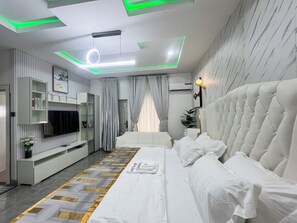 Economy Room, Balcony, City View | Desk, laptop workspace, blackout drapes, soundproofing - JRC Chariot Hotel (Abuja)
