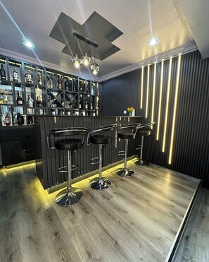 Economy Room, Balcony, City View | Bar (on property) - JRC Chariot Hotel (Abuja)