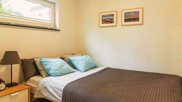 Deluxe Apartment, Garden View | Pillowtop beds, blackout drapes, iron/ironing board, free WiFi