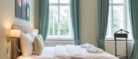 Cortinas blackout, tabla de planchar con plancha y wifi gratis
