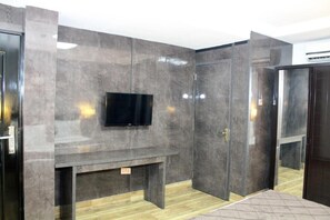 Deluxe Room, Balcony, City View | Desk, laptop workspace, blackout curtains, soundproofing - The Regal Boutique Hotel (Abuja)