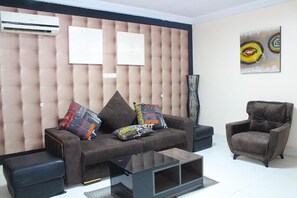Deluxe Room, Balcony, City View | Living area - The Regal Boutique Hotel (Abuja)
