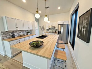 Fridge, microwave, oven, stovetop - Luxury New Beachfront Home Steps to Sand (Flagler Beach)