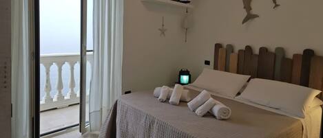 2 quartos, acesso à internet, roupa de cama