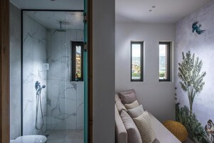 Shower, rainfall showerhead, eco-friendly toiletries, hair dryer
