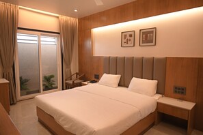 Habitación ejecutiva | Camas supletorias, wifi gratis, ropa de cama